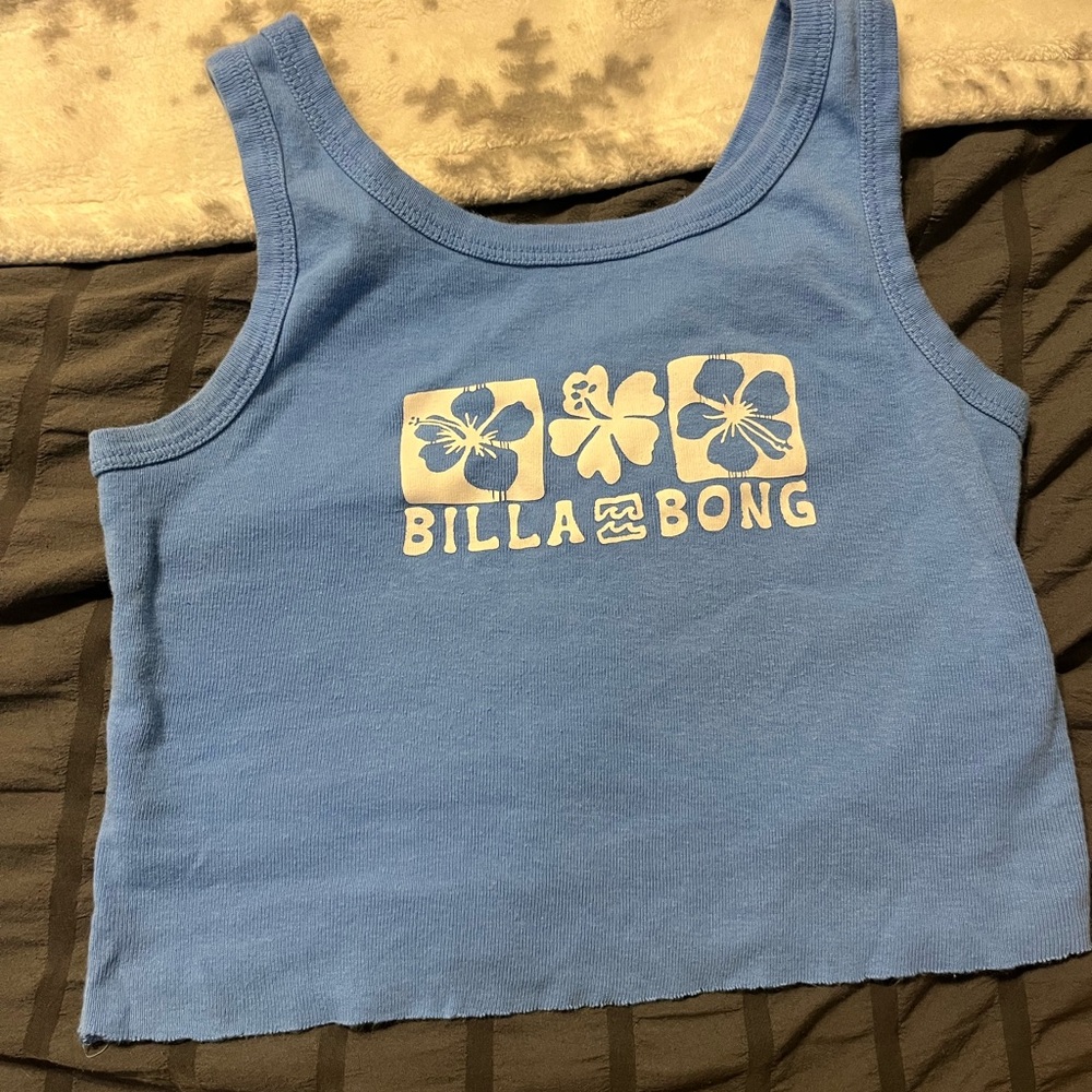 Billabong blue tanktop, kids medium,no rips,tears, or any stains.